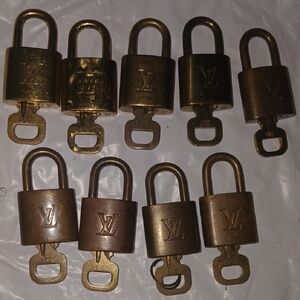 Authentic Louis Vuitton Gold Padlock Collection